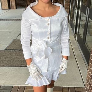 HerringStone's white suit with skirt and jacket